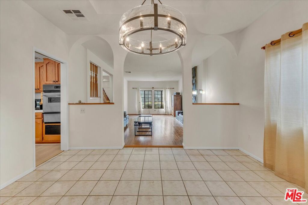 Residential for sale at 9322 Columbus Avenue, North Hills CA featuring 5 beds and 5 baths