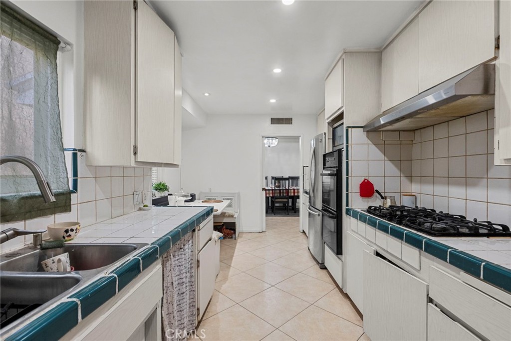 Residential for sale at 9253 Hayvenhurst Avenue, North Hills CA featuring 3 beds and 2 baths