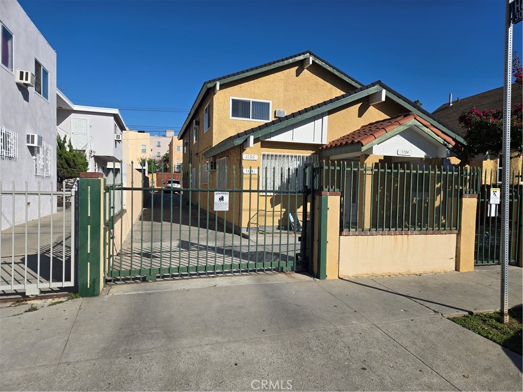 Triplex for sale at 1134 S Oxford Avenue, Los Angeles, CA