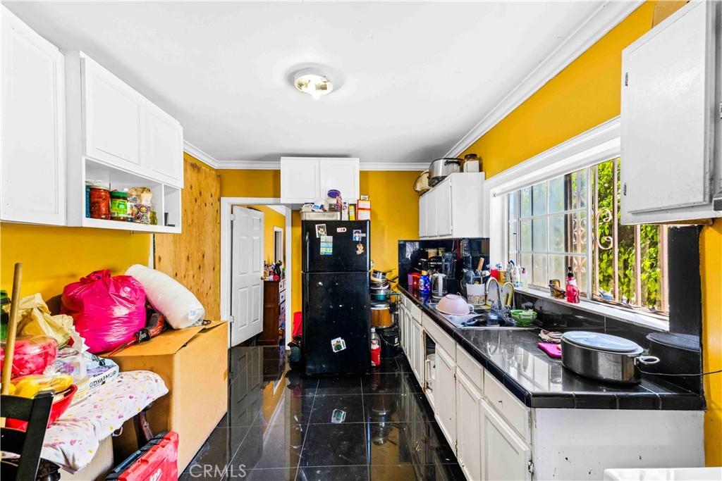 Duplex for sale at 736 W 41st Place, Los Angeles, CA featuring 7 beds and 4 baths
