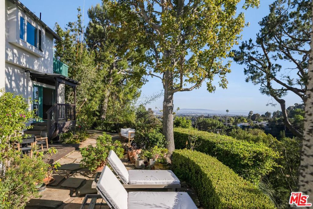 Residential for sale at 1030 N Kenter Avenue, Los Angeles CA featuring 3 beds and 2 baths