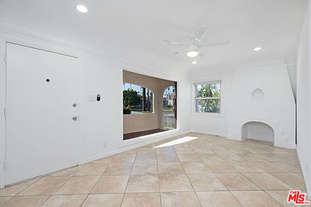 Residential Income for sale at 5700 S Gramercy Place, Los Angeles, CA featuring 4 beds and 3 baths