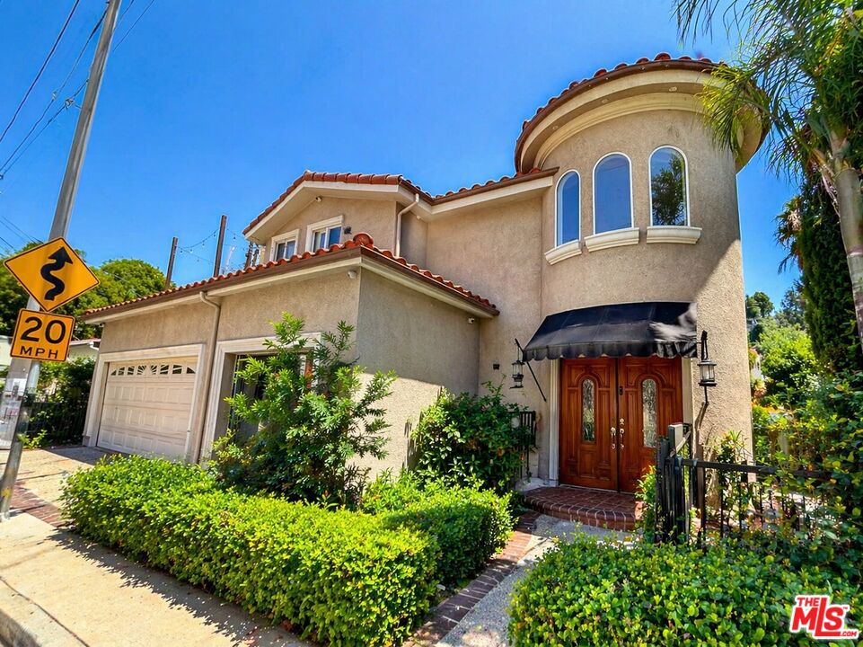 Single Family Residence for sale at 610 Montecito Drive, Los Angeles, CA featuring 5 beds and 5 baths