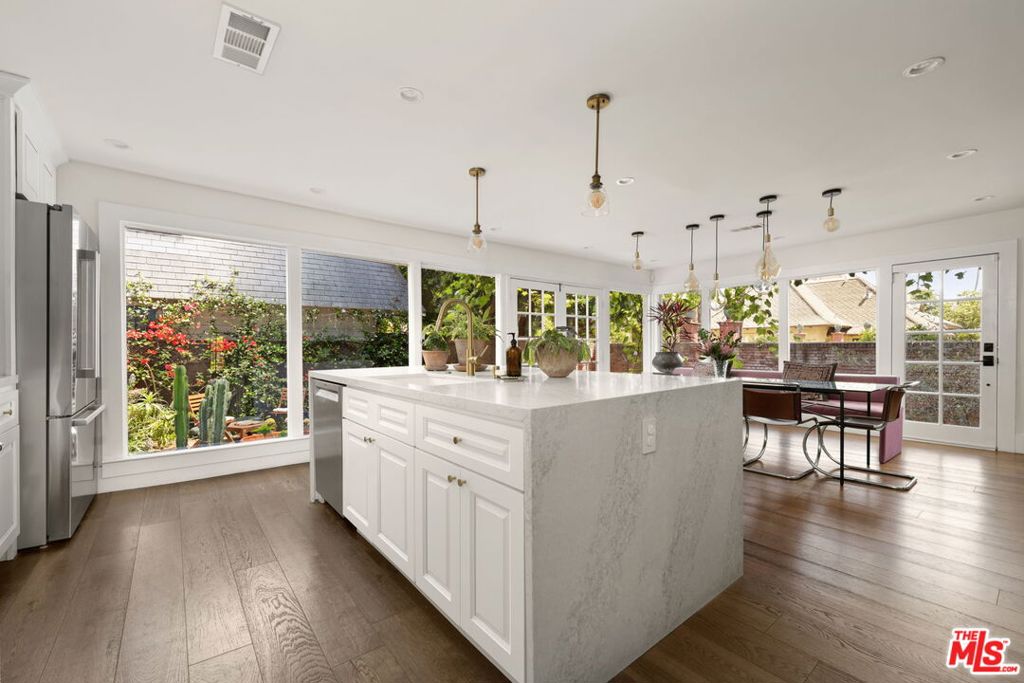 Residential for sale at 2248 S Hobart Boulevard, Los Angeles CA featuring 3 beds and 4 baths