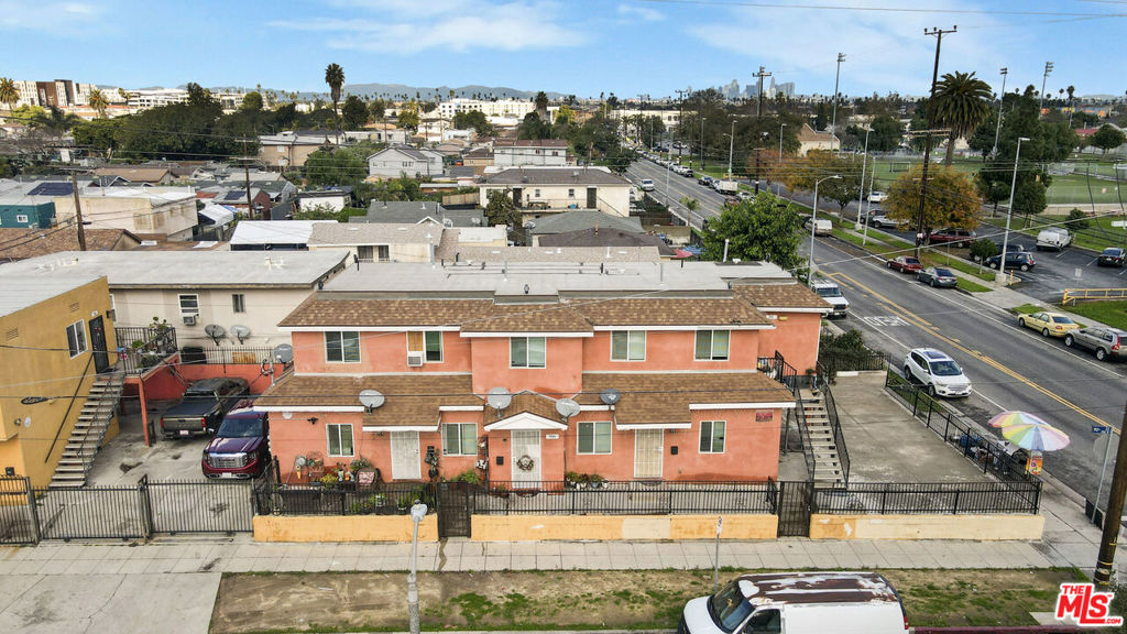 Residential Income for sale at 711 W 90th Street, Los Angeles CA featuring 13 beds and 6 baths