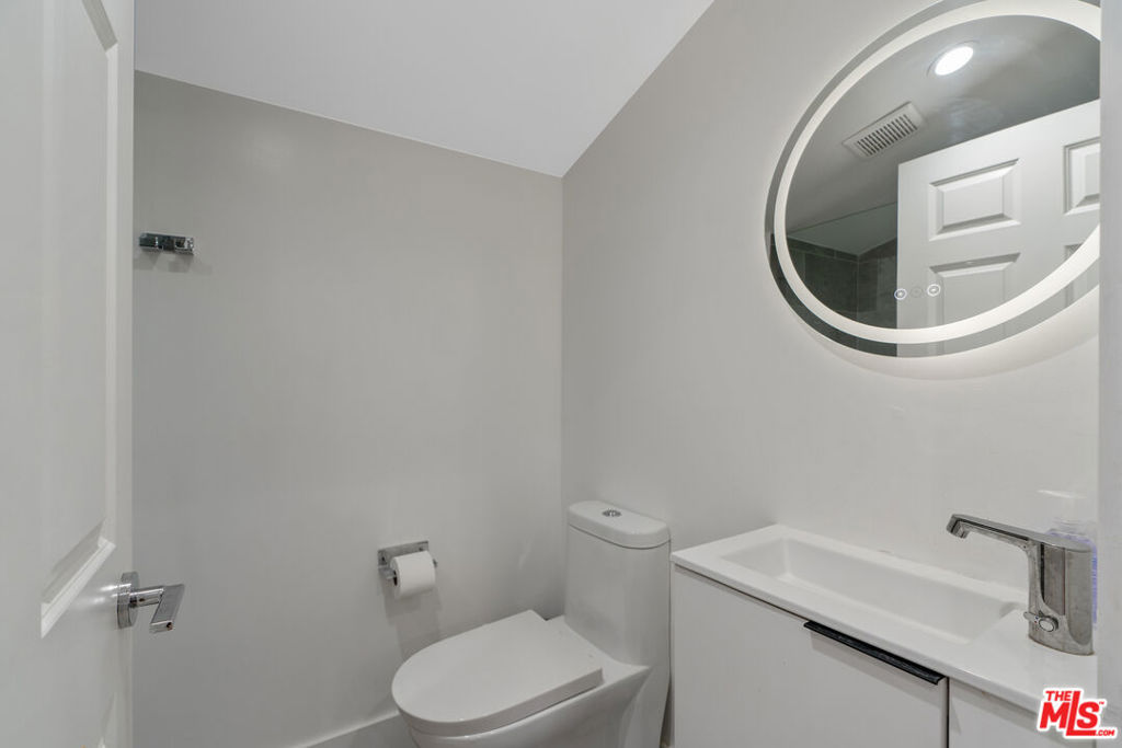 Residential for sale at 1152 S Windsor Boulevard, Los Angeles CA featuring 5 beds and 4 baths
