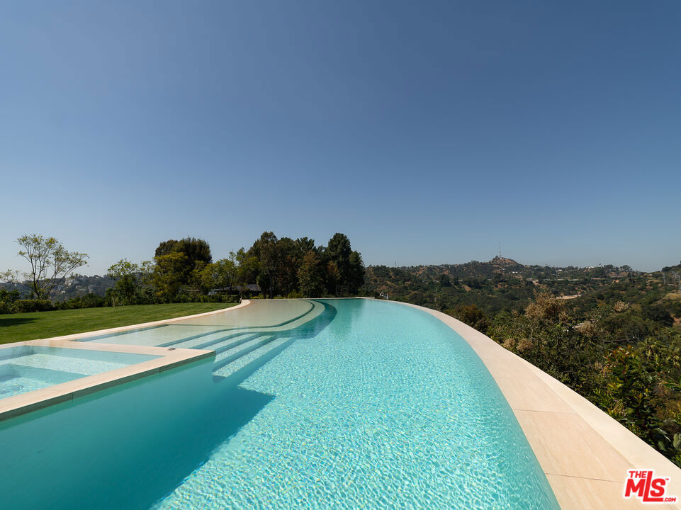 Residential for sale at 2700 Woodstock Road, Los Angeles CA featuring 7 beds and 9 baths