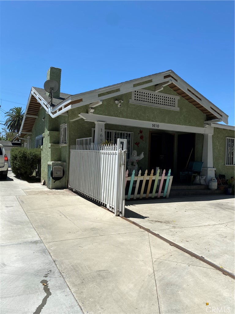 Residential for sale at 1650 W 39th Place, Los Angeles CA featuring 5 beds and 2 baths