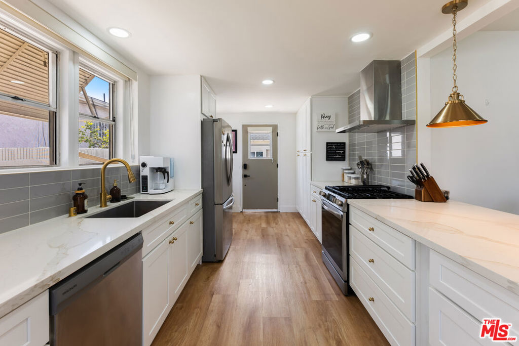 Residential for sale at 1722 W 107th Street, Los Angeles CA featuring 3 beds and 2 baths