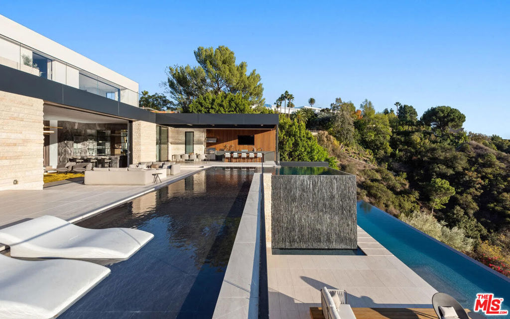 Single Family Residence for sale at 1035 Stradella Road, Los Angeles, CA featuring 7 beds and 11 baths