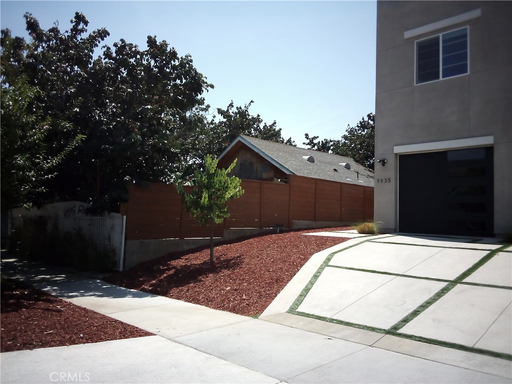 Triplex for sale at 1127 N Commonwealth Avenue, Los Angeles, CA featuring 3 beds and 1 bath