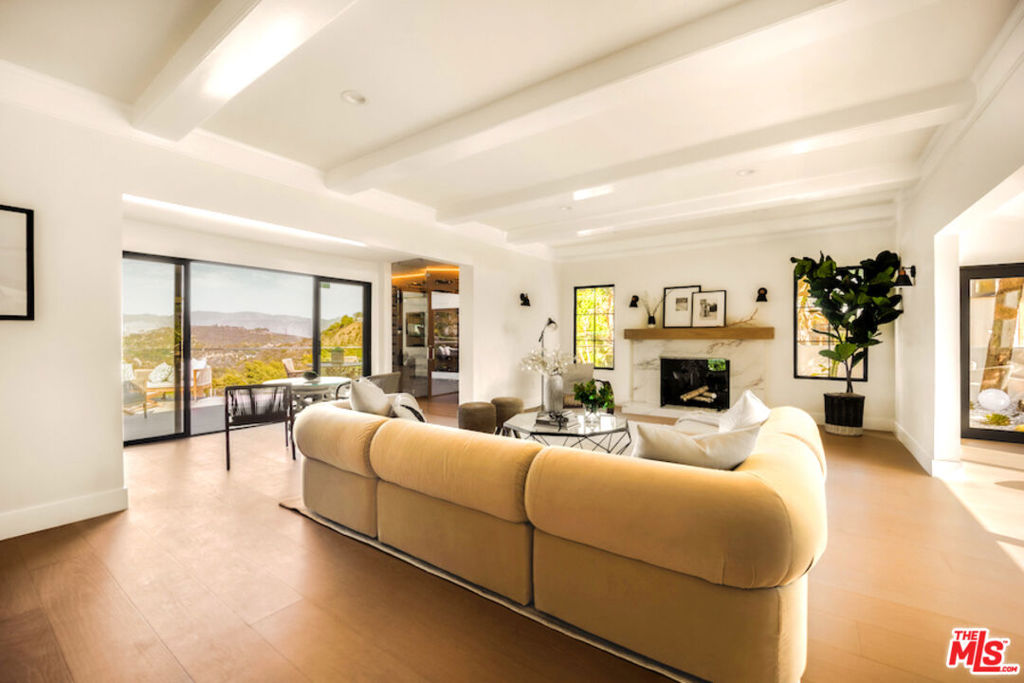 Residential for sale at 8921 Appian Way, Los Angeles CA featuring 3 beds and 4 baths