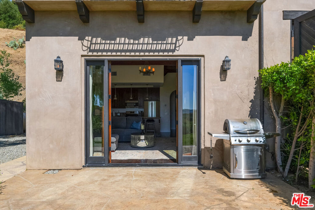 Residential Lease for rent at Mulholland Highway GH, Malibu CA featuring 2 beds and 2 baths