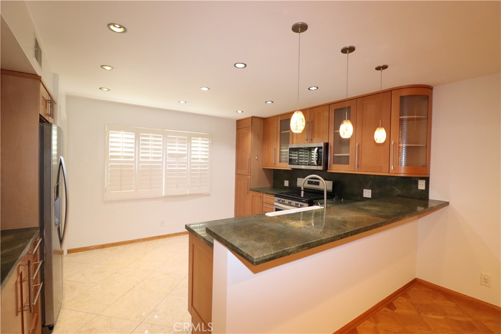 Residential for sale at 6207 1/2 Nita, Woodland Hills CA featuring 2 beds and 3 baths