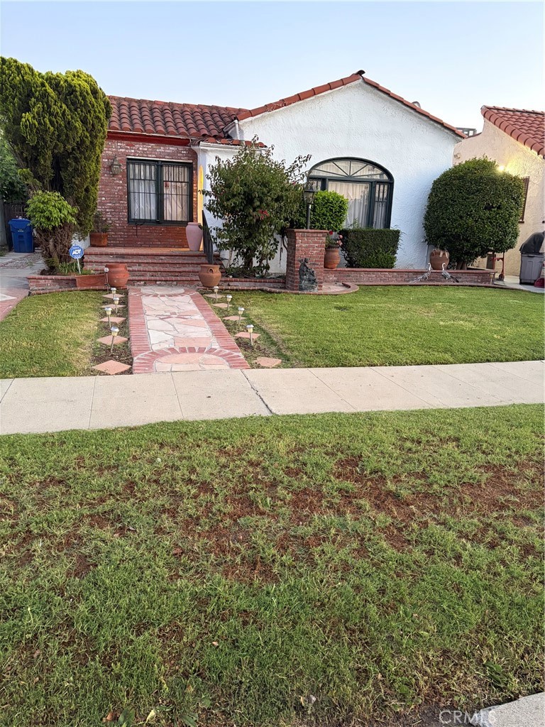 Residential for sale at 1922 W 80th, Los Angeles CA featuring 3 beds and 2 baths