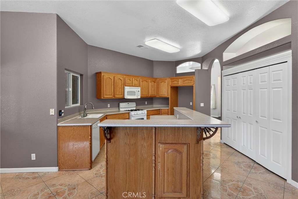 Residential for sale at 7264 Kuki, Oak Hills CA featuring 4 beds and 3 baths