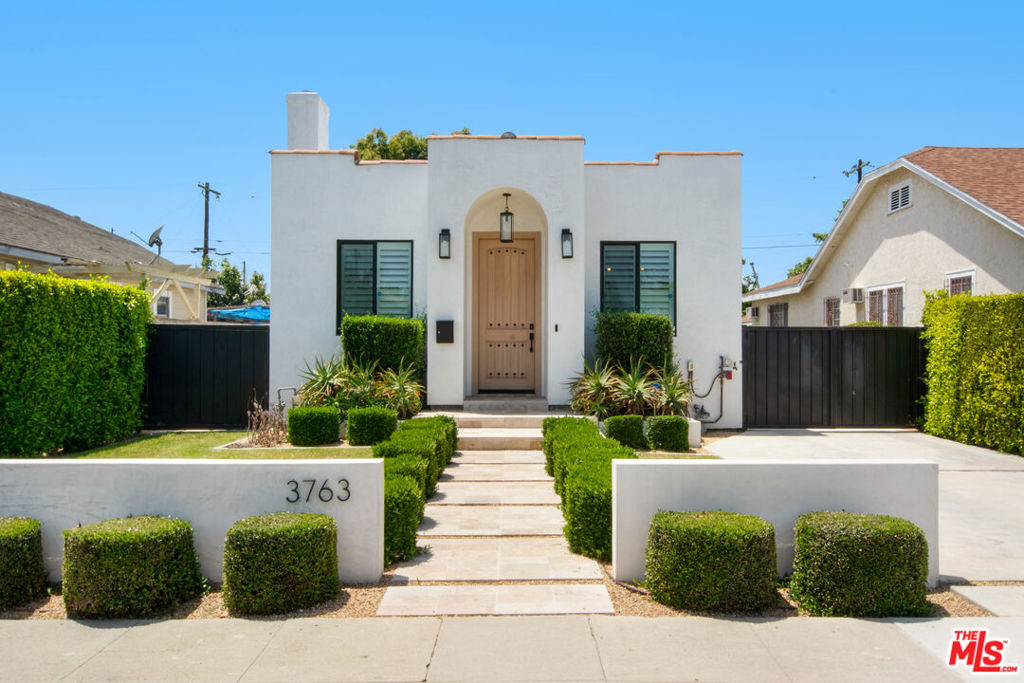 Residential for sale at 3763 S Gramercy Place, Los Angeles CA featuring 4 beds and 3 baths