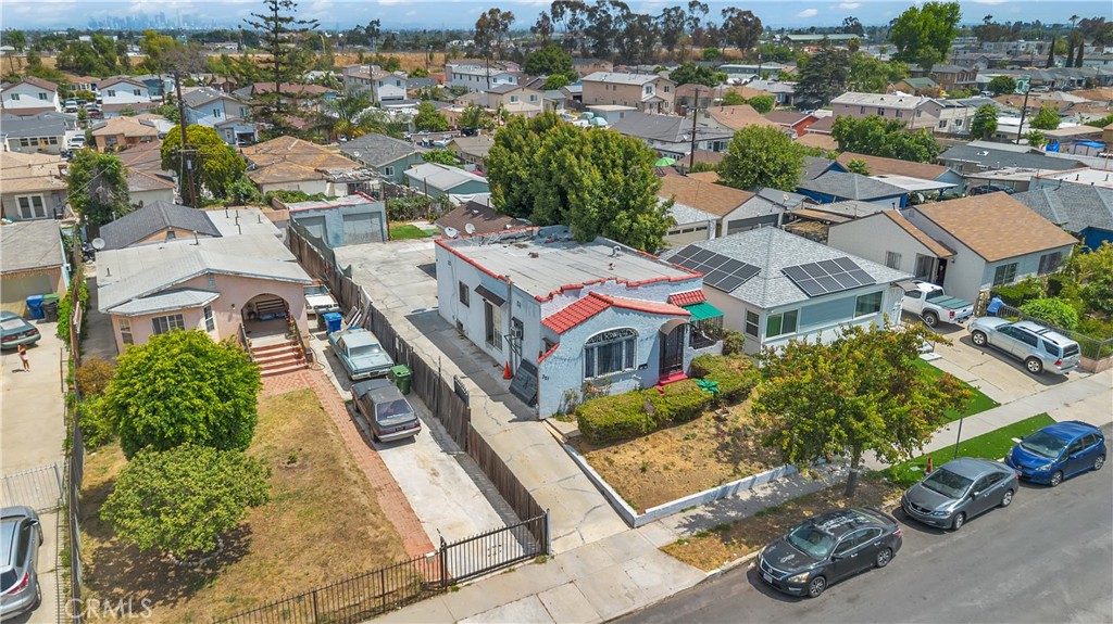 Residential for sale at 321 E 119th St, Los Angeles CA featuring 3 beds and 2 baths