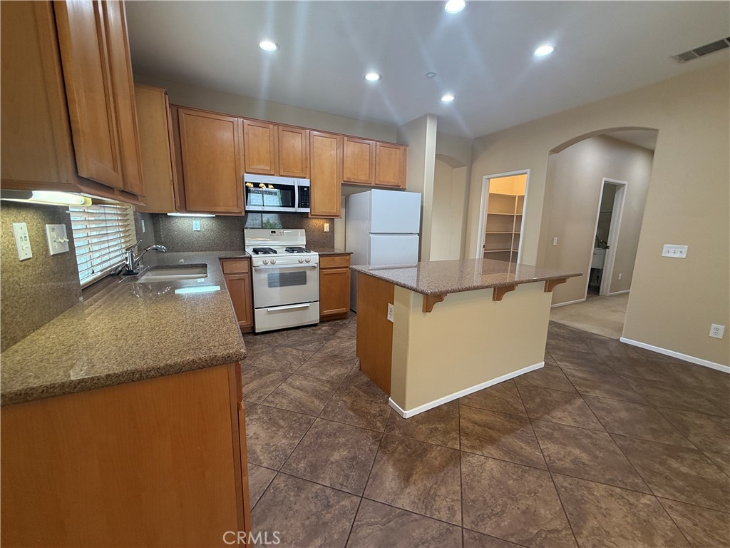 Residential Lease for rent at 7219 Riley Drive, Fontana CA featuring 3 beds and 2 baths
