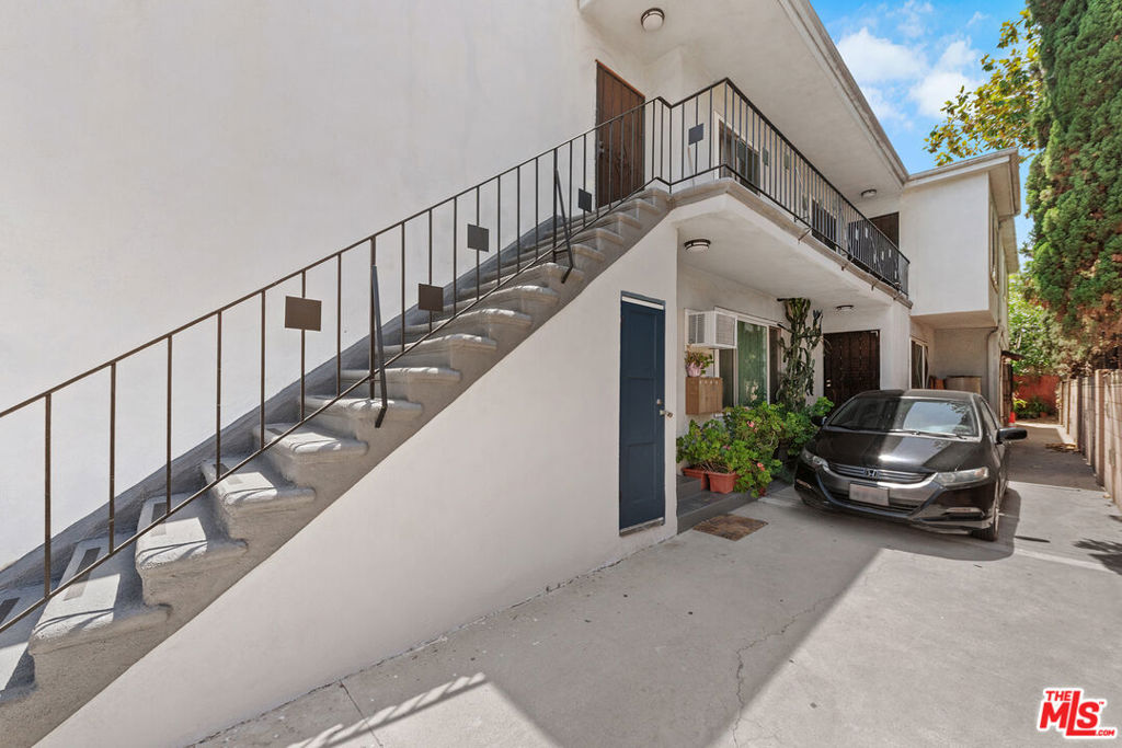 Residential Income for sale at 10734 Palms Boulevard, Los Angeles CA featuring 9 beds and 6 baths