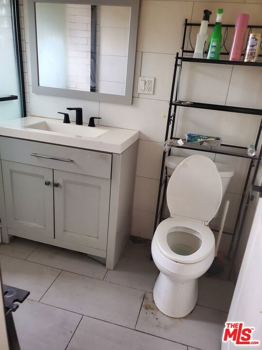 Residential Income for sale at 1431 W 56th Street, Los Angeles CA featuring 6 beds and 3 baths