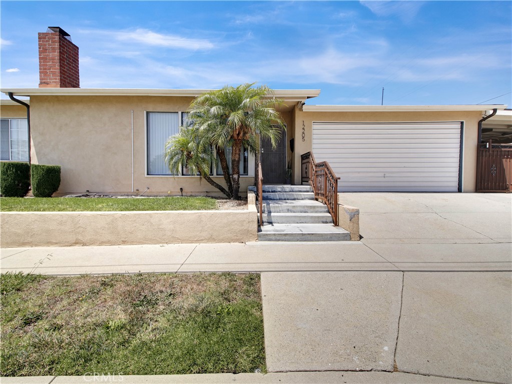 Residential for sale at 12205 S Halldale, Los Angeles CA featuring 4 beds and 2 baths
