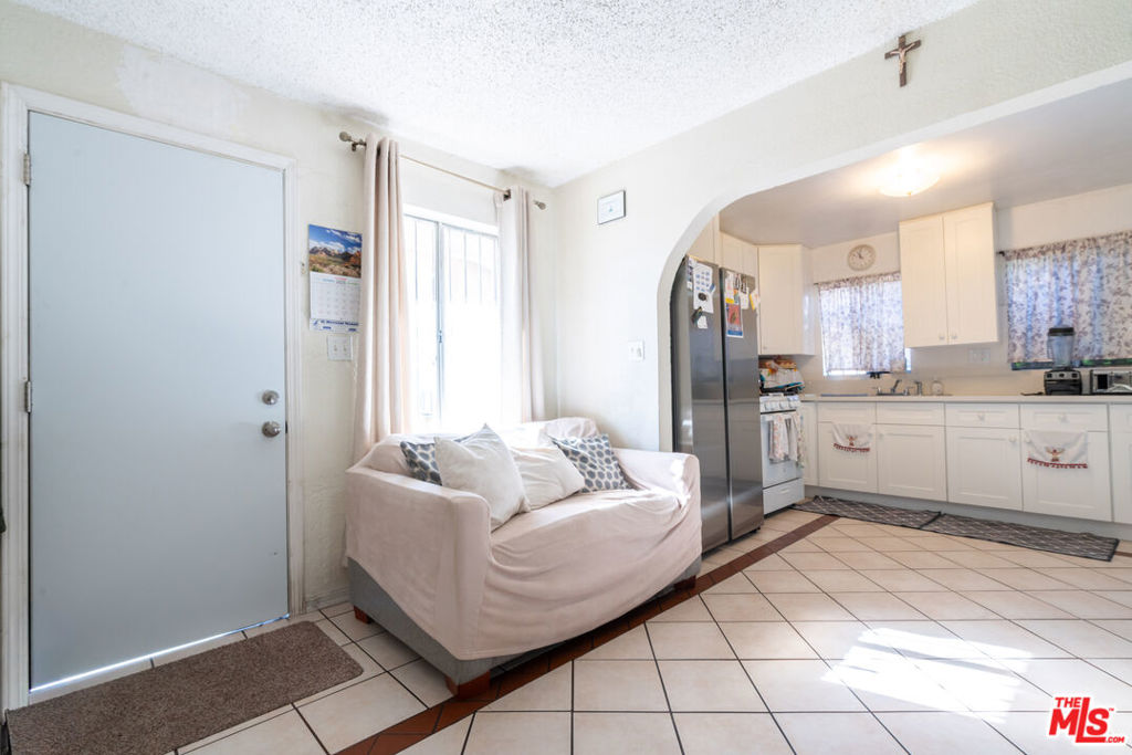 Residential Income for sale at 341 E 71st Street, Los Angeles, CA featuring 6 beds and 3 baths