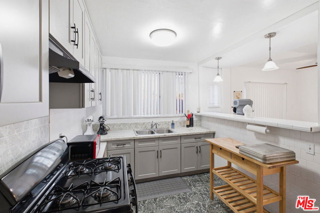 Residential Income for sale at 4430 Arlington Avenue, Los Angeles, CA featuring 5 beds and 3 baths