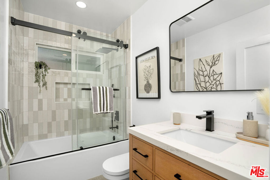 Residential for sale at 5418 S Rimpau Boulevard, Los Angeles CA featuring 5 beds and 4 baths