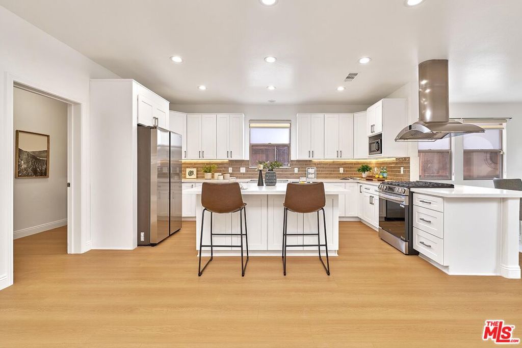 Residential for sale at 646 N Sierra Bonita Avenue, Los Angeles CA featuring 4 beds and 4 baths