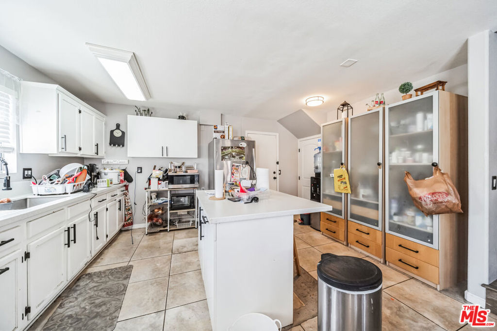 Single Family Residence for sale at 12221 Athens Way, Los Angeles, CA featuring 5 beds and 3 baths