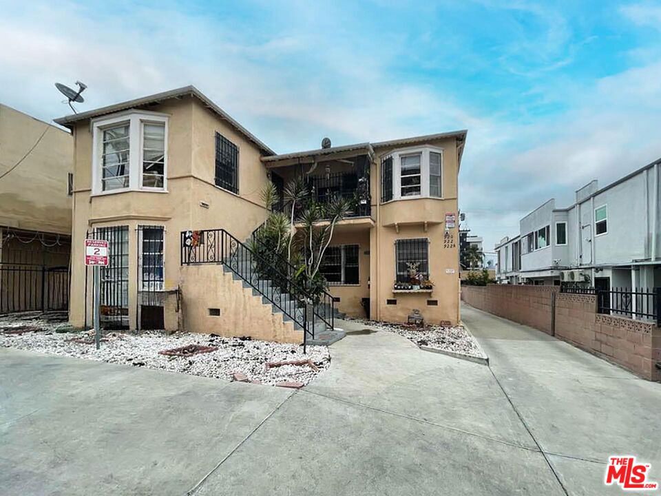 Residential Income for sale at 920 S Kenmore Avenue, Los Angeles, CA featuring 6 beds and 4 baths