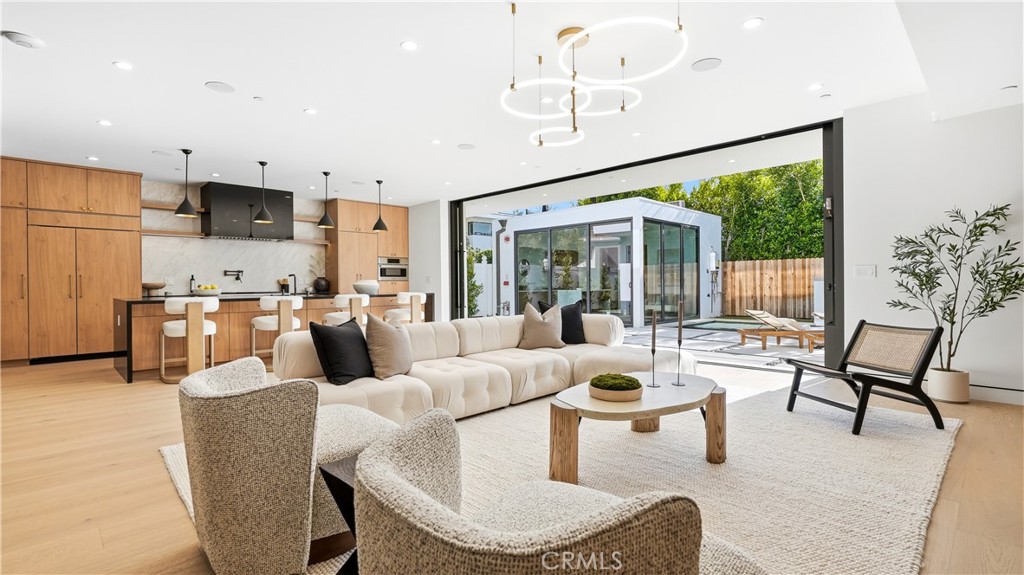 Residential for sale at 813 N Genesee Avenue, Los Angeles CA featuring 7 beds and 8 baths