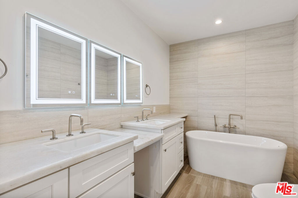 Residential Lease for rent at 9249 Burton Way 404, Beverly Hills CA featuring 2 beds and 3 baths