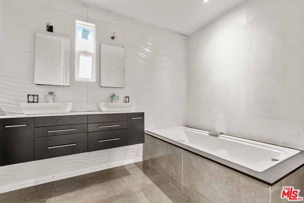Single Family Residence for sale at 5502 S Chariton Avenue, Los Angeles, CA featuring 4 beds and 3 baths
