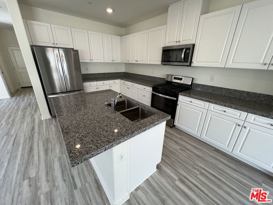 Residential Lease for rent at 25198 Harmony Avenue, Moreno Valley CA featuring 4 beds and 3 baths