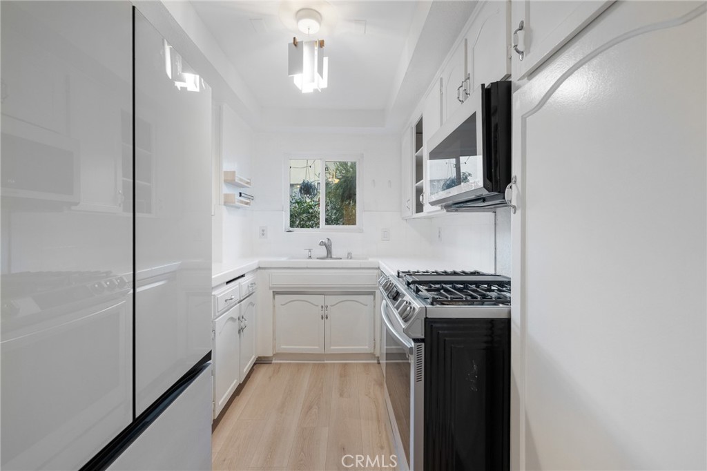Residential for sale at 1355 N Sierra Bonita 208, Los Angeles CA featuring 1 bed and 1 bath