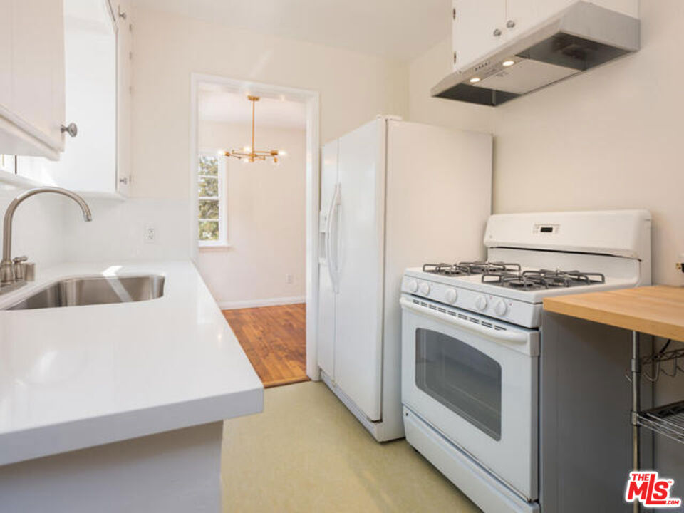 Residential Income for sale at 5116 Baltimore Street, Los Angeles CA featuring 4 beds and 2 baths