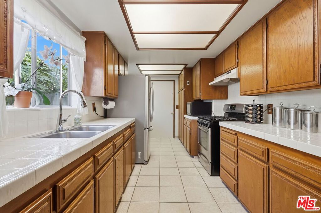 Residential for sale at 12421 Barbara Avenue, Los Angeles CA featuring 4 beds and 3 baths
