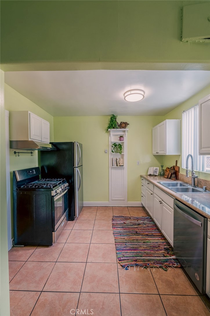 Residential for sale at 7122 /7124 De Longpre, Los Angeles CA featuring 4 beds and 4 baths