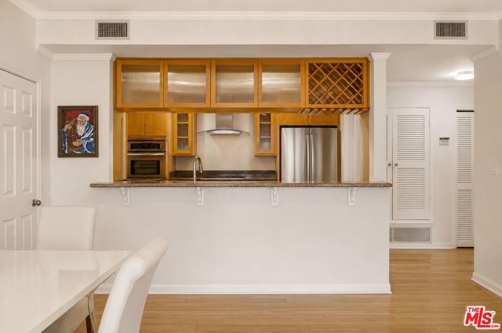 Residential for sale at 104 S Hayworth Avenue 103, Los Angeles CA featuring 2 beds and 2 baths