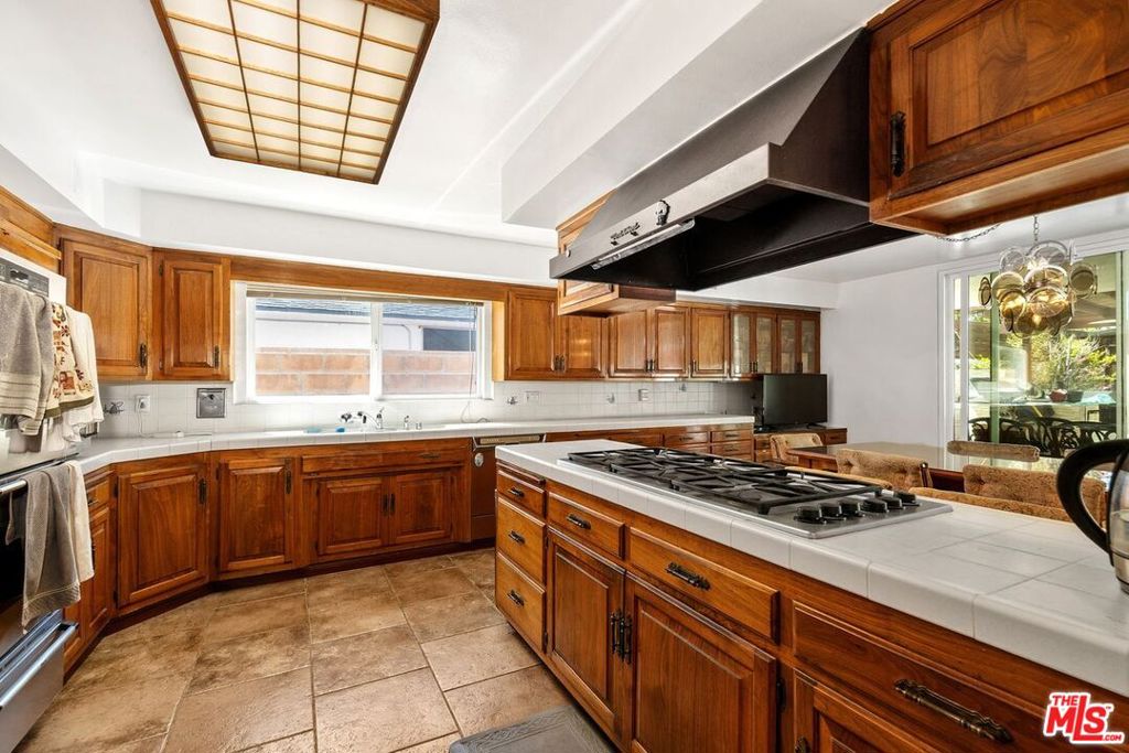 Single Family Residence for sale at 6505 S Halm Avenue, Los Angeles, CA featuring 5 beds and 5 baths