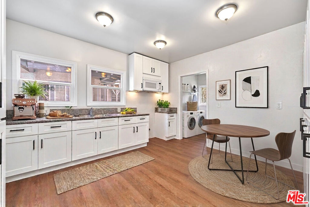 Residential for sale at 2205 S Hobart Boulevard, Los Angeles CA featuring 5 beds and 5 baths