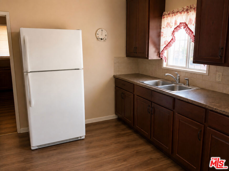 Residential Income for sale at 9014 S Fir Avenue, Los Angeles CA featuring 7 beds and 4 baths