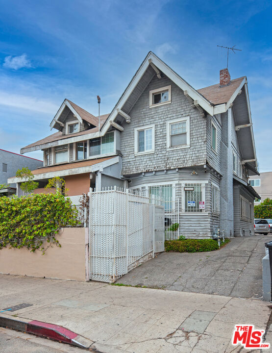 Residential for sale at 2961 W 8th Street, Los Angeles CA featuring 6 beds and 2 baths