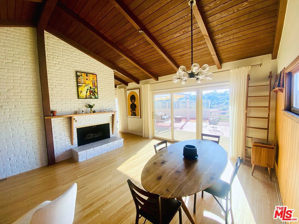 Residential for sale at 4623 Don Miguel Drive, Los Angeles CA featuring 3 beds and 3 baths