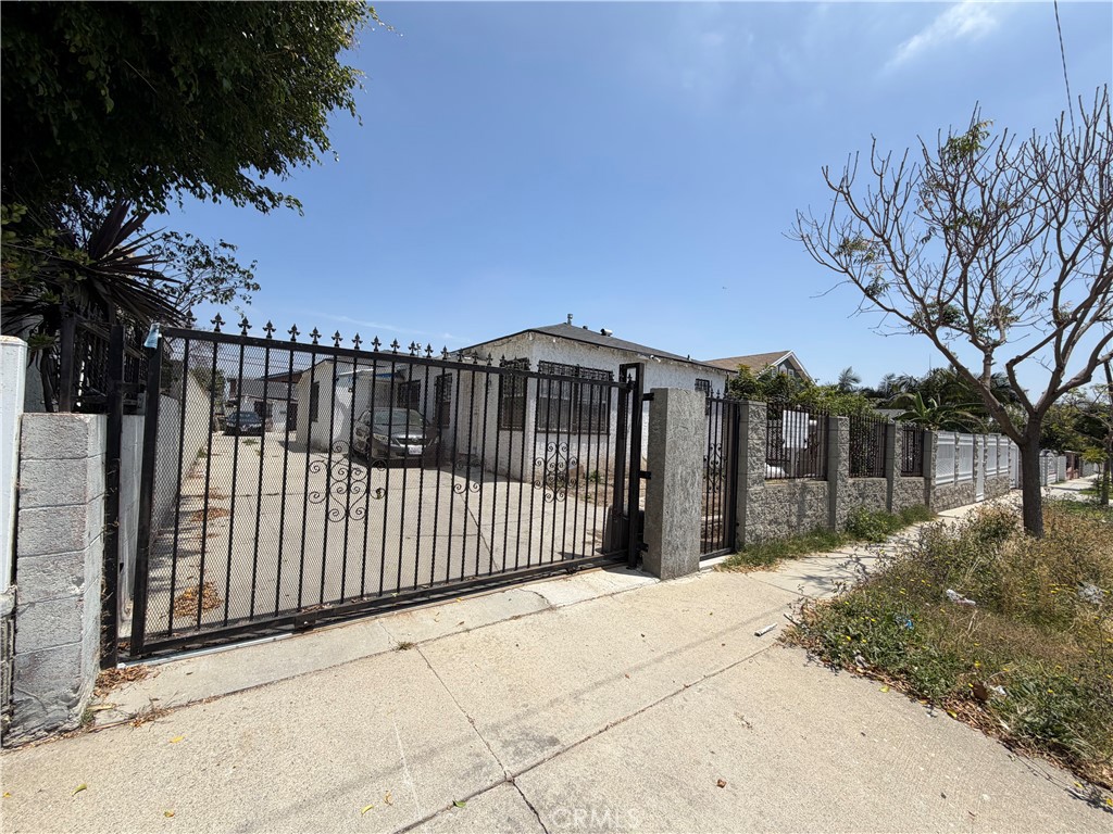 Triplex for sale at 1249 W 90th Place, Los Angeles, CA featuring 4 beds and 3 baths