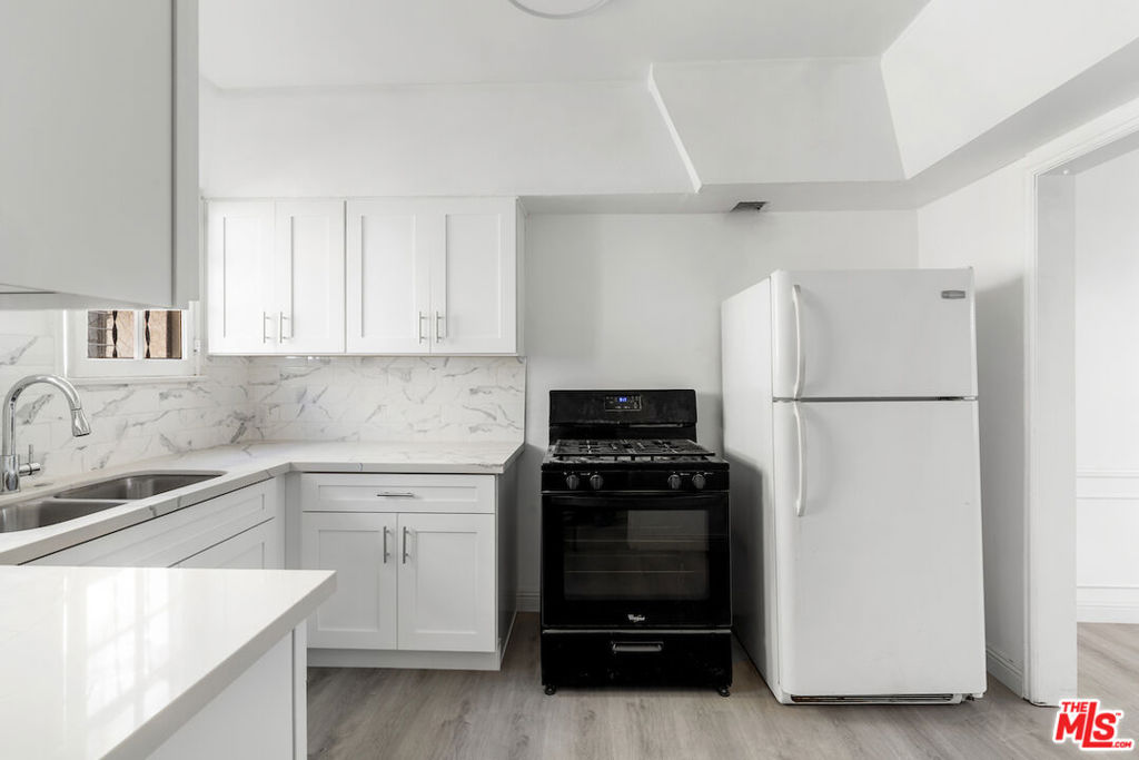 Residential Income for sale at 1527 S Bedford Street, Los Angeles, CA featuring 6 beds and 4 baths
