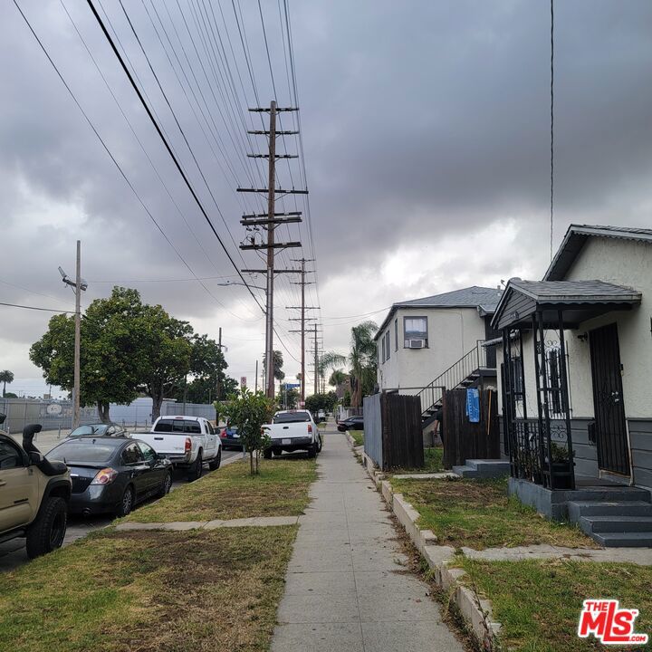 Residential Income for sale at 715 W 92nd Street, Los Angeles CA featuring 5 beds and 4 baths