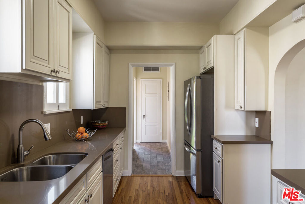 Residential Income for sale at 1122 S Hayworth Avenue, Los Angeles CA featuring 4 beds and 2 baths